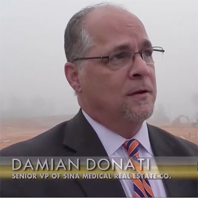 A man named Damien Donati wearing glasses at groundbreaking for Hattiesburg Clinic